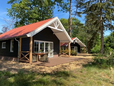 Bijzonder overnachten in een XL Boslodge Bijzonder overnachten in een XL Boslodge