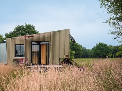 Tiny House op natuurkampeerterrein met fijn eethuis Tiny House op natuurkampeerterrein met fijn eethuis