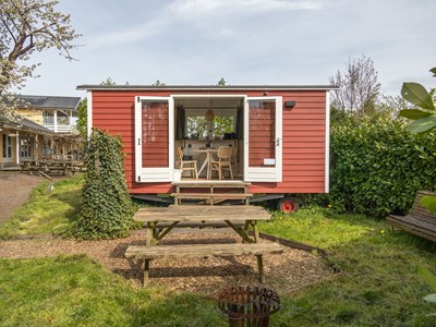 Authentieke Pipowagen nabij het water Authentieke Pipowagen nabij het water