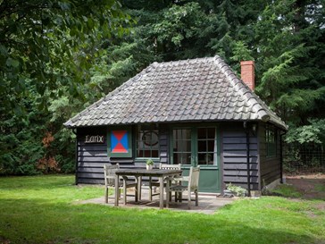 Authentiek houten huisje op een Veluws landgoed Authentiek houten huisje op een Veluws landgoed
