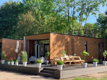 Tiny House met dakterras en zicht op de bootjes Tiny House met dakterras en zicht op de bootjes