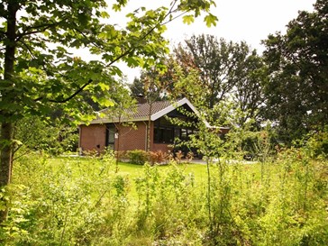 Gezellig vakantiehuisje met hottub en royale tuin Gezellig vakantiehuisje met hottub en royale tuin