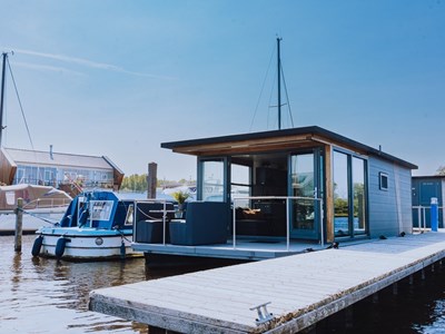 Overnachten op het water in een luxe Havenlodge Overnachten op het water in een luxe Havenlodge