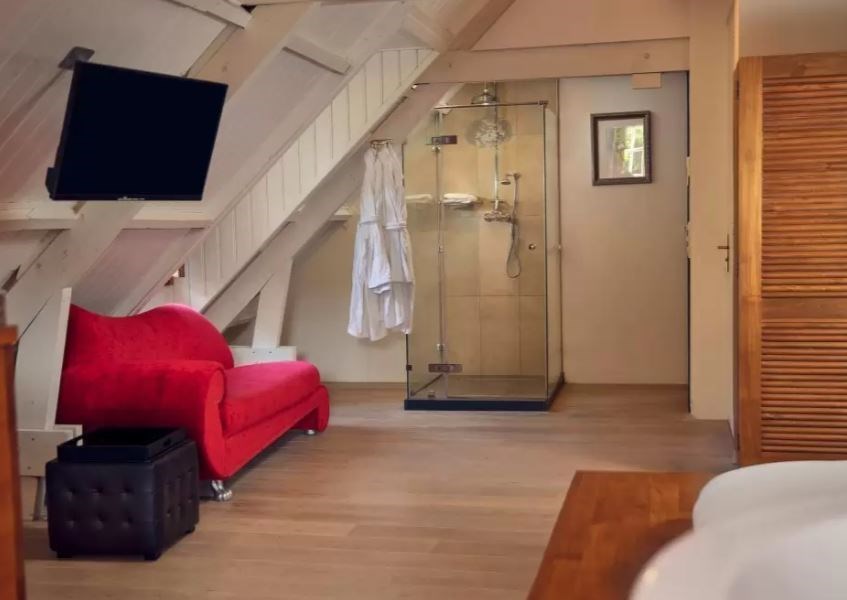 Romantische Zoldersuite met een prachtig uitzicht over het landgoed