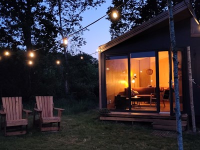 Tiny house met hot tub en uitzicht op de boomgaard Tiny house met hot tub en uitzicht op de boomgaard