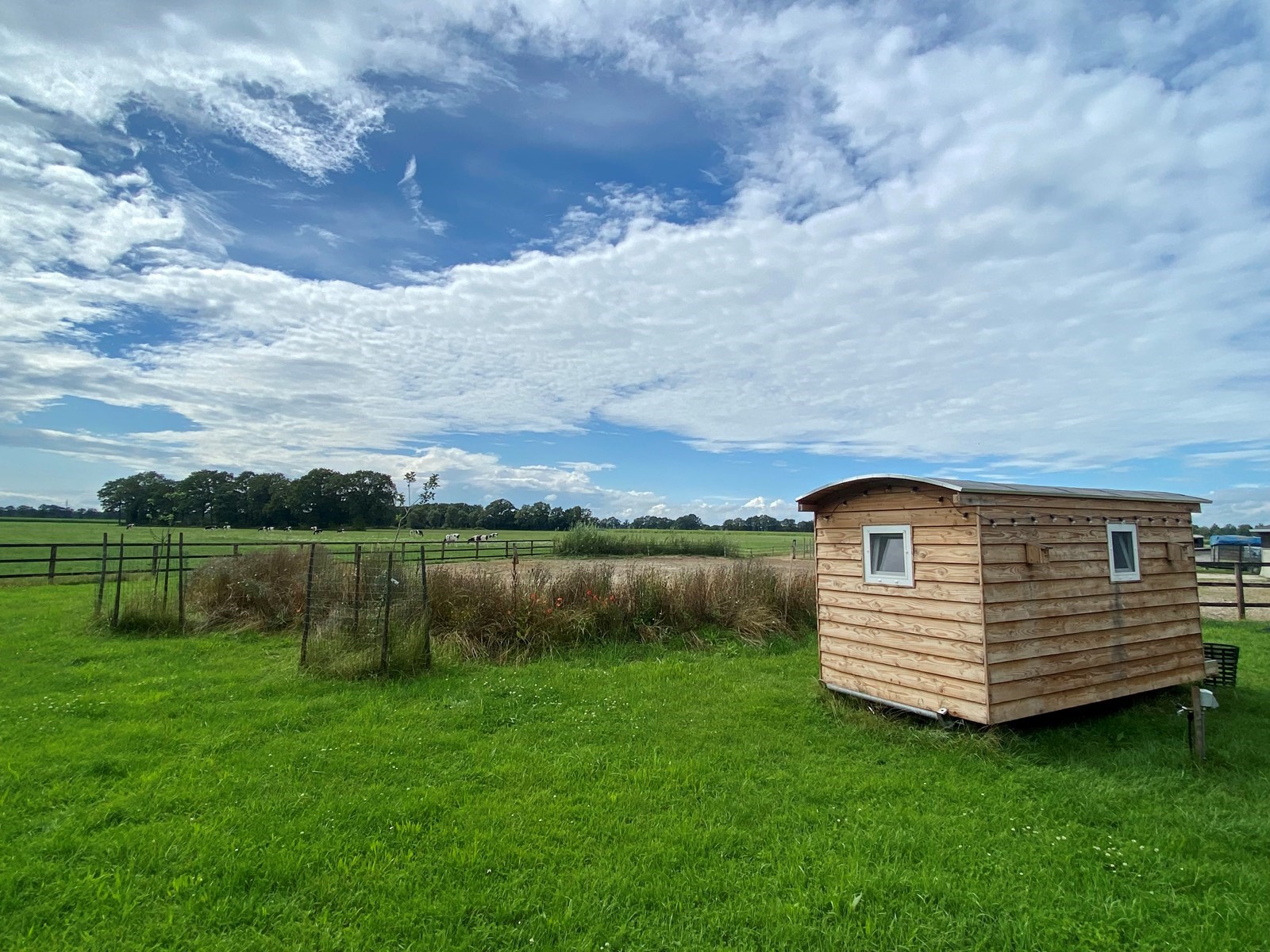 Beleef de boerderij in een gezellig tiny house