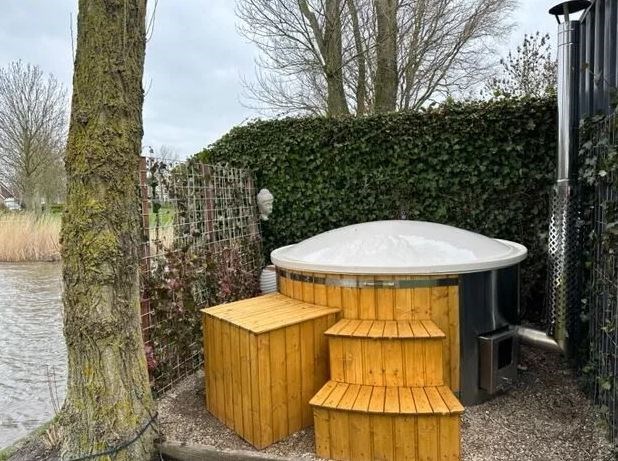 Slapen in een 200 jaar oude boerderij met houtgestookte sauna en hottub