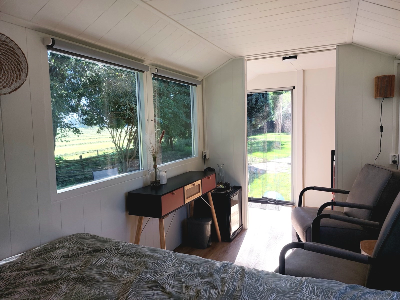 Pipowagen met een weids uitzicht over de velden