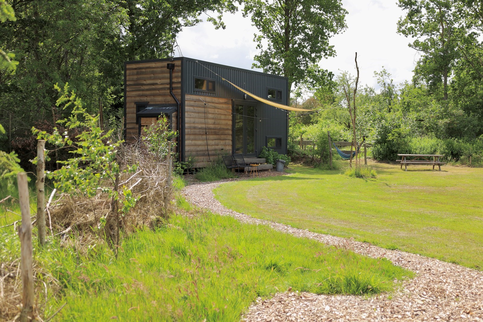 Tiny house mét hottub direct aan een boomgaard 
