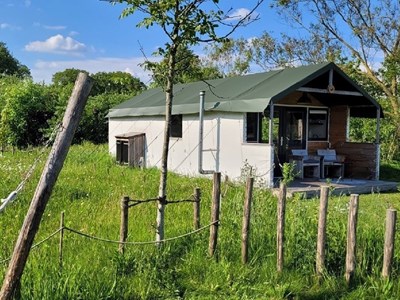 Glampingtent uitzicht over het omliggende Achterhoekse coulisselandschap Glampingtent uitzicht over het omliggende Achterhoekse coulisselandschap