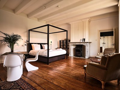 Familiekamer met uitzicht op het park van een prachtige buitenplaats Familiekamer met uitzicht op het park van een prachtige buitenplaats