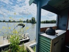 Tiny beach house op een eiland met  je eigen boot Tiny beach house op een eiland met  je eigen boot