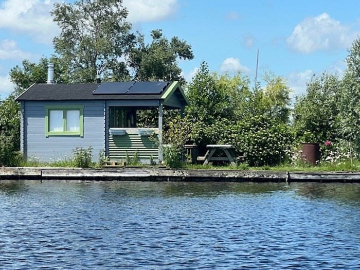 Tiny beach house op een eiland met  je eigen boot Tiny beach house op een eiland met  je eigen boot