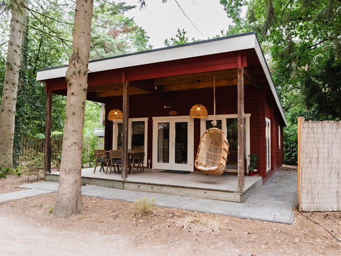 Knus boshuisje met een natuurtuin en eigen infraroodsauna Knus boshuisje met een natuurtuin en eigen infraroodsauna