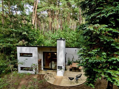 Sixties Bosvilla met giga aquarium in privé bos van 5000m2 Sixties Bosvilla met giga aquarium in privé bos van 5000m2