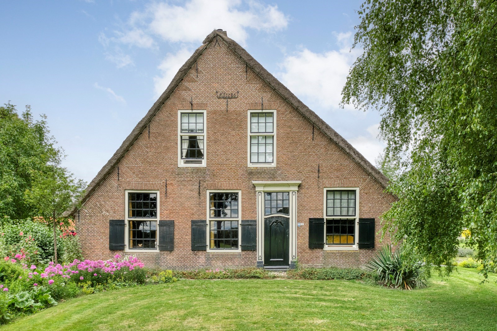 Monumentale boerderij uit 1786 met een wellnessplein