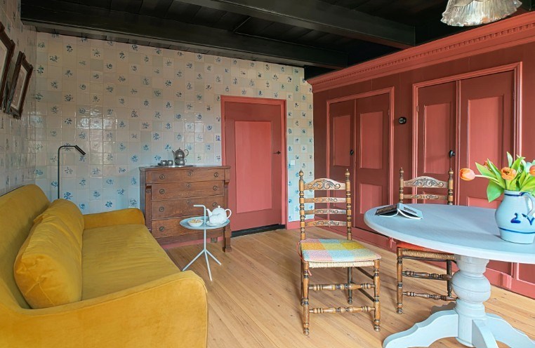 Authentiek vissershuisje uit 1836 direct aan de Waddendijk in het meest noordelijke plaatsje van Friesland