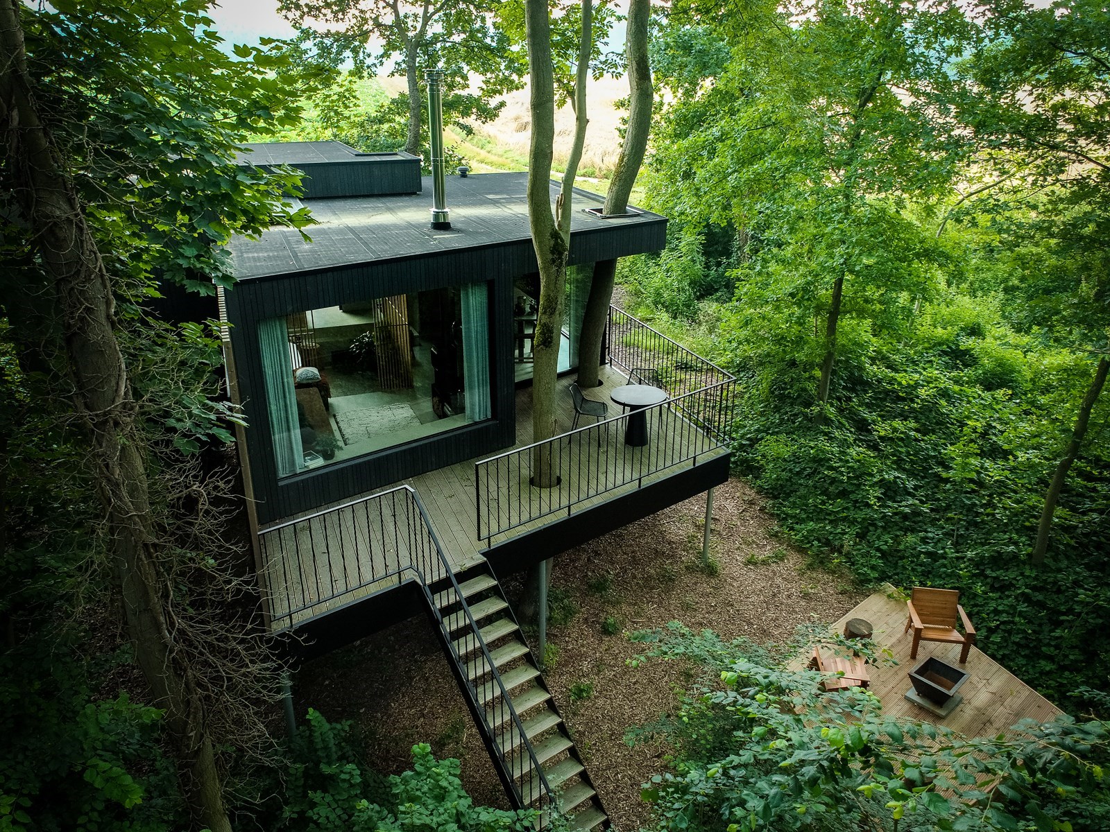 Unieke design droomplek tussen de bomen