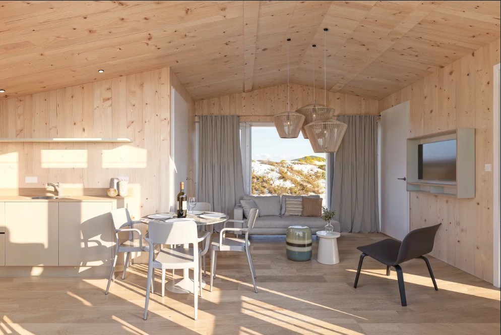 De zee horen vanuit dit moderne strandhuisje