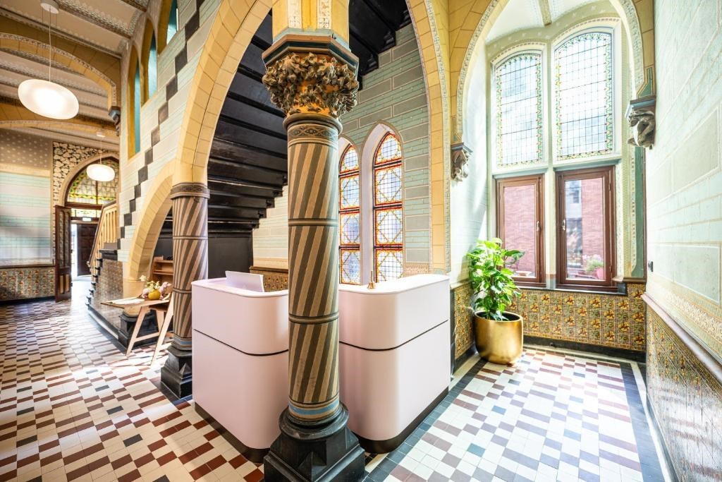 Historische suite met vrijstaand bad in de voormalige monumentale Statenzaal van Zwolle