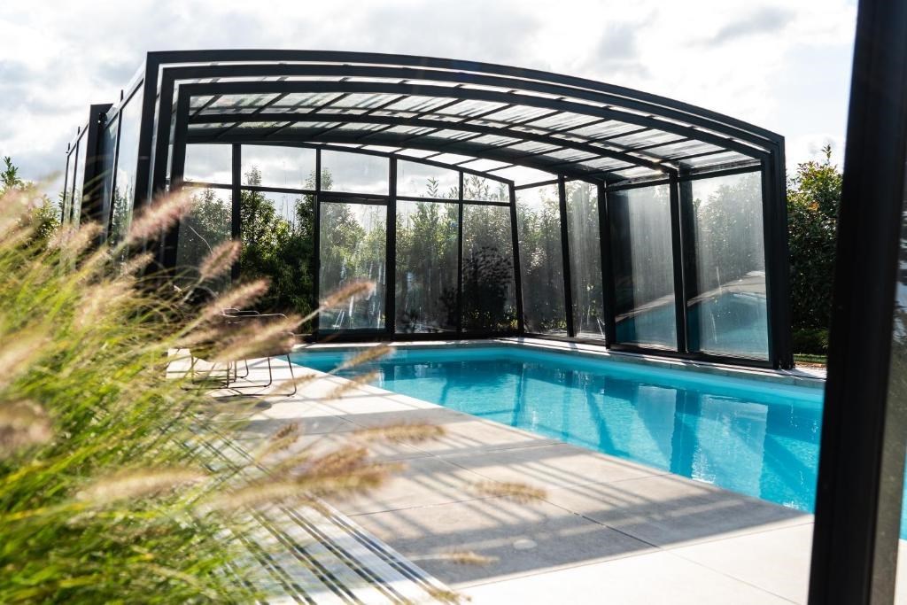 Vrijstaand wellnesshuisje met verwarmd privézwembad, jacuzzi en sauna