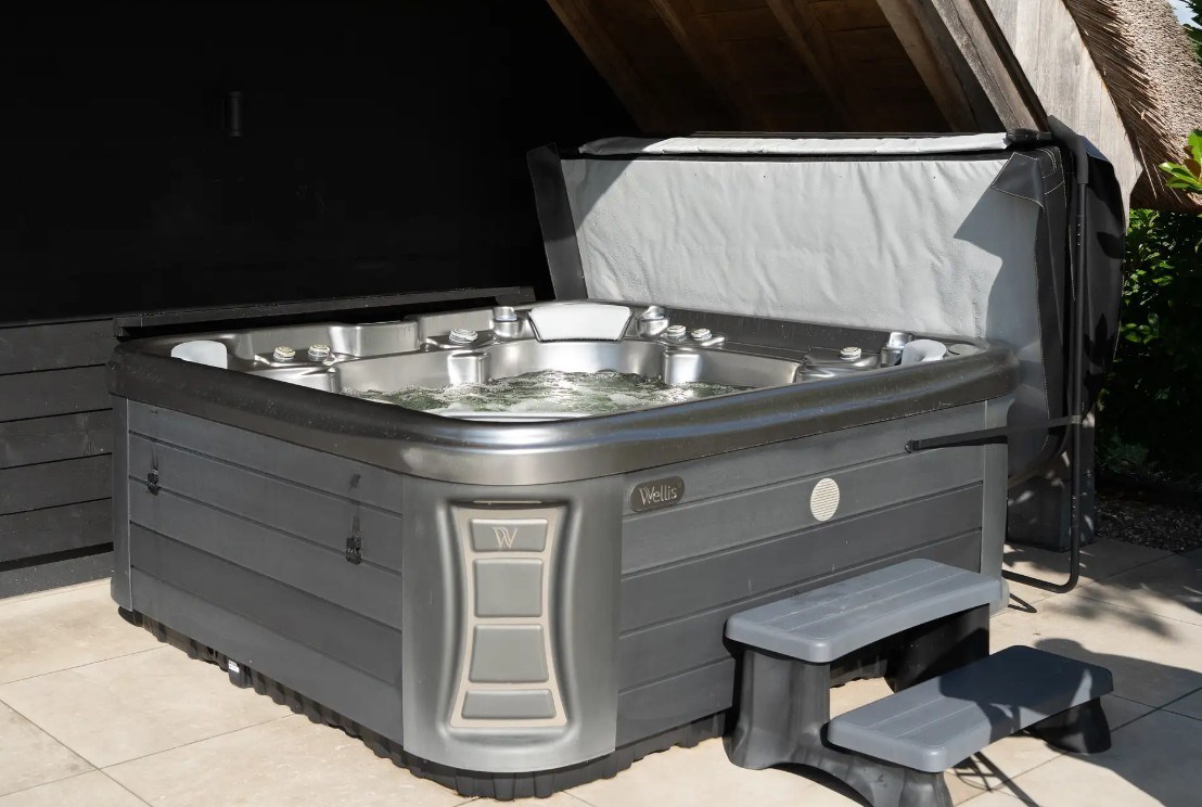 Vrijstaand wellnesshuisje met verwarmd privézwembad, jacuzzi en sauna