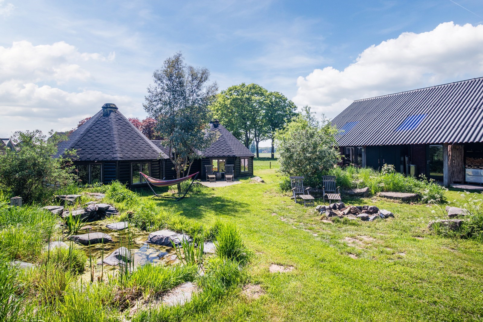 Deze voormalige kapschuur is nu een groen paradijs