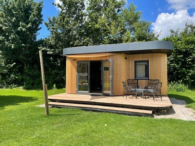 Tiny House met een unieke ronde vorm Tiny House met een unieke ronde vorm