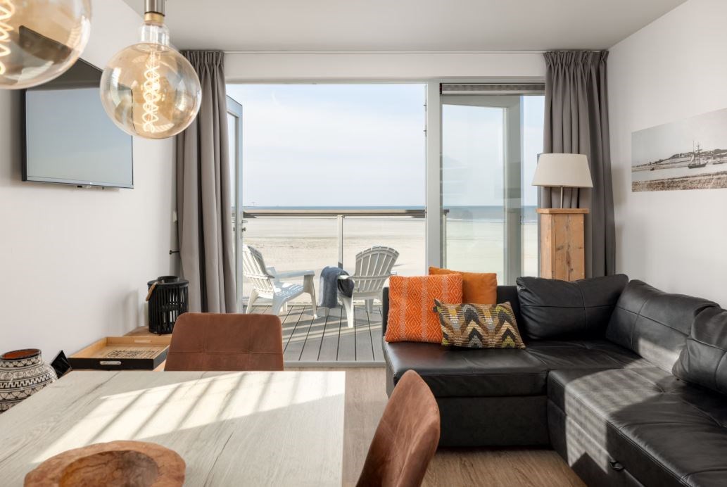 Strandvilla óp het strand