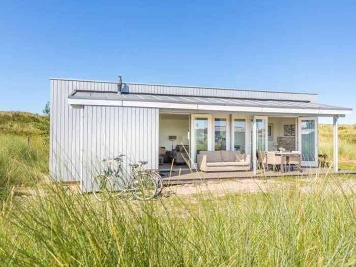 Wakker worden tussen de duinen in deze Duinlodge op Ameland(NL)